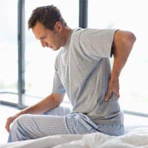 Что делать, болит спина в положении лежа